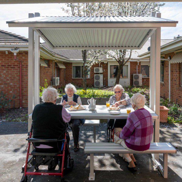 Ladies enjoying tea on Felton outdoor shelter